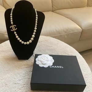 Chanel pearl necklace with box.